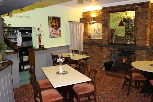 Restaurant o un lloc per menjar a Oliver Twist Country Inn