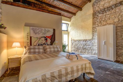 Postel nebo postele na pokoji v ubytování B&B Vico Manenti