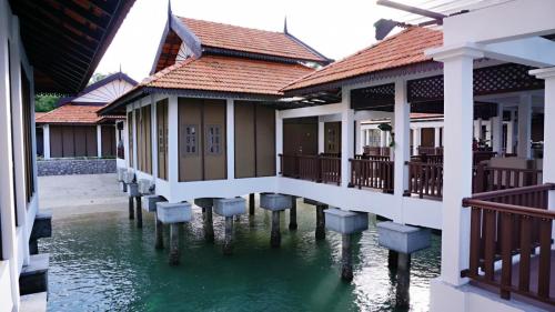 a row of houses in the water in aominium at Casuarina Pangkor in Pangkor