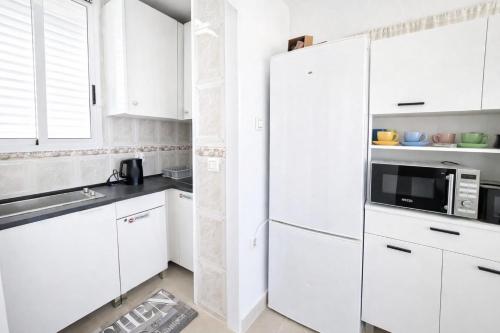 Two-room apartment with terrace, parking and pool