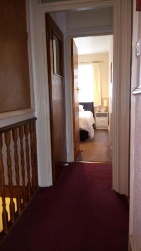 Postel nebo postele na pokoji v ubytování Brampton Guest House