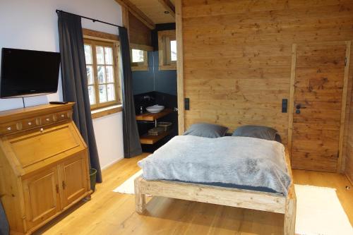 Un pat sau paturi într-o cameră la Haus Iris