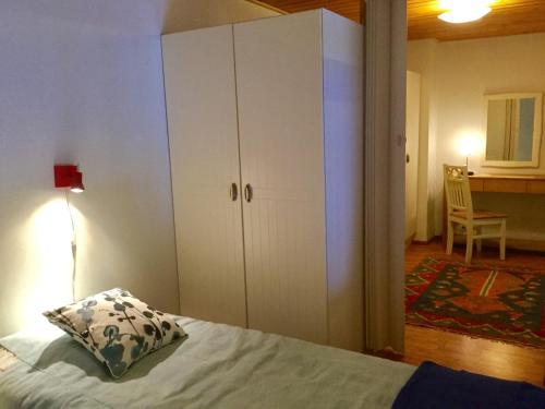Katil atau katil-katil dalam bilik di Herranterttu Apartments