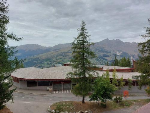Résidence Aiguille Grive Bat Iii - Appartement 2 pièces 6 personnes en duplex, skis aux pieds, dans le village de Charmettoger à Arc 1800. MAE-6954