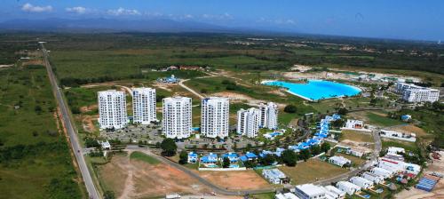 an aerial view of a city with tall buildings and a lake at Playa Blanca Edificio Founders 3 in Playa Blanca
