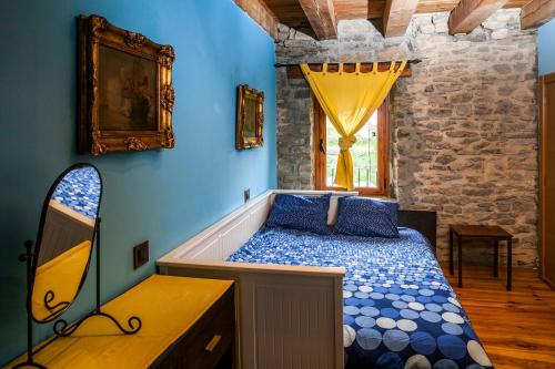 A bed or beds in a room at Casa Dorondón