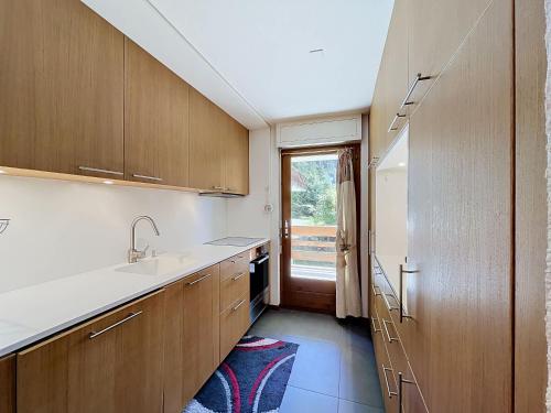 Concorde 123 Ski In 2 Bedroom Apartment in Verbier with Mountain Views and Fireplace