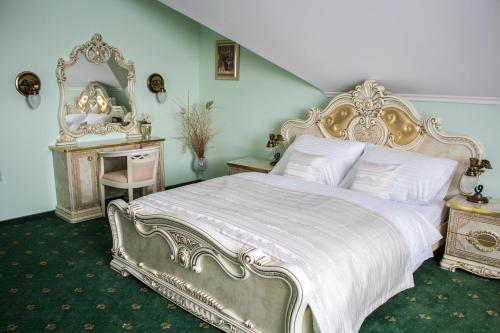 Posteľ alebo postele v izbe v ubytovaní Hotel Viliam Frano