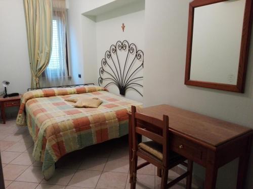 Ліжко або ліжка в номері Hotel Ponte San Vittorino