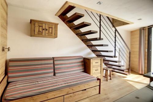 Résidence Caron - Appartement rénové, spacieux et moderne · Départ et retour skis aux pieds · Balcon MAE-0884