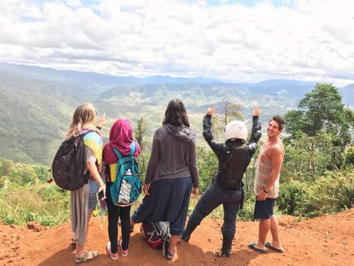 a group of people standing on top of a mountain at Vietnam Phuot Real Home in Kon Tum