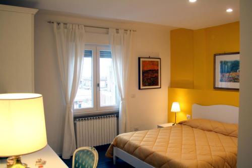 A bed or beds in a room at BB Sesto Piano
