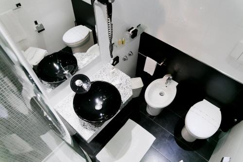 Phòng tắm tại Ilga Hotel