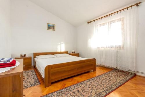 Posteľ alebo postele v izbe v ubytovaní Apartment Zdenka 1