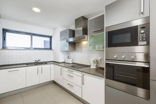 Marina Village | Pool, Garage & Balcony