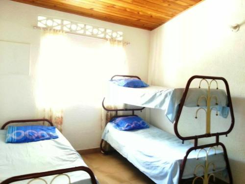 Postel nebo postele na pokoji v ubytování Flandes Resort