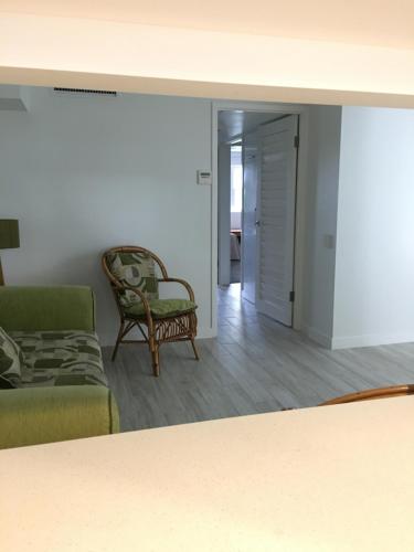 Ruang duduk di Camargue Beachfront Apartments