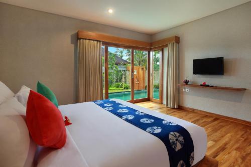 Giường trong phòng chung tại Sativa Villas Ubud with Private Pool