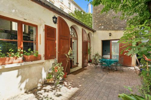 Unique Garden House - Heart of Paris