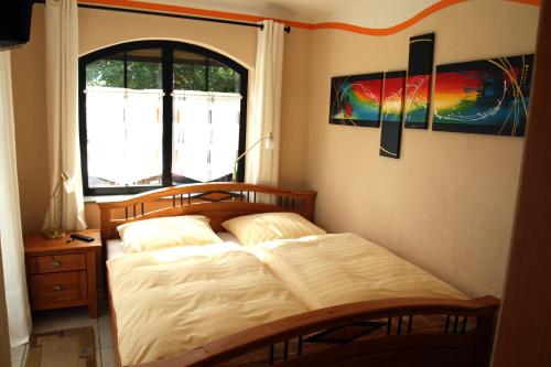 Säng eller sängar i ett rum på Pavillon an der Ilm