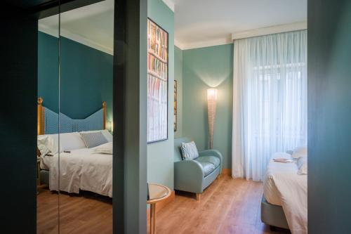 Postel nebo postele na pokoji v ubytování Hotel Spadari Al Duomo
