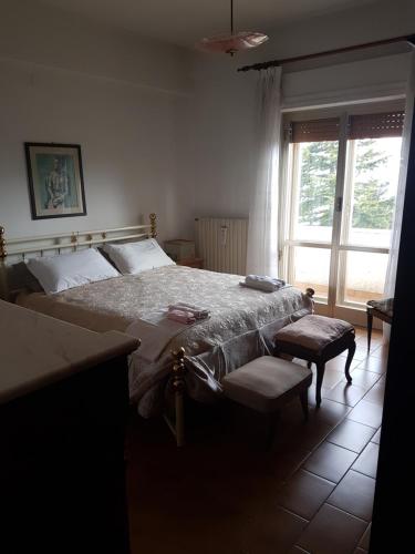 Кровать или кровати в номере Clementina B&B