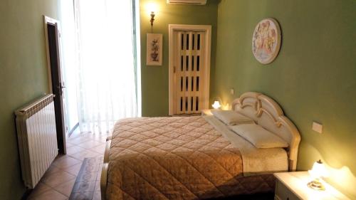 Giường trong phòng chung tại La Dimora