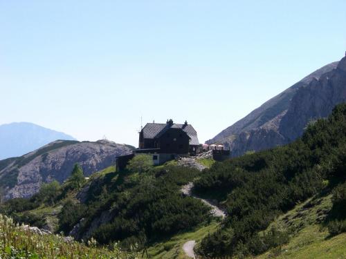 a house on the side of a mountain at Frühstückspension Seeberghof in Seewiesen