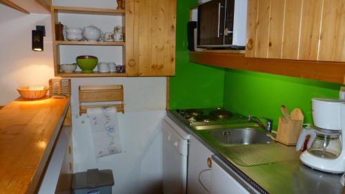 Résidence Aiguille Grive Bat Iii - Appartement 2 pièces 6 personnes en duplex, skis aux pieds, dans le village de Charmettoger à Arc 1800 MAE-1895