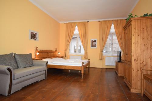 Photo de la galerie de l'établissement Pension Zámecká Apartmá - Castle Apartments, à Český Krumlov