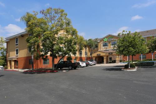 a parking lot in front of a building with cars at Extended Stay America Suites - Los Angeles - Arcadia in Arcadia