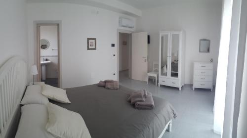 Katil atau katil-katil dalam bilik di B&B Sogno Salentino