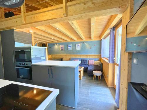 Résidence Campanules - Ski aux pieds, appartement pour 6 personnes tout en bois au coeur des Ménuires MAE-9071