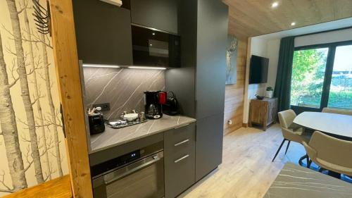 Résidence Fermes Emiguy - Appartement 4 personnes avec piscine MAE-4191