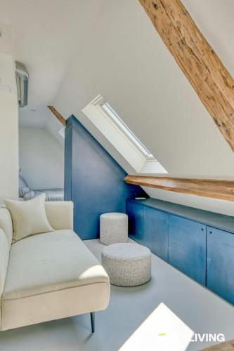 Bright studio with a view over the rooftops of Paris 9th