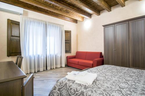 Cama o camas de una habitación en L'Arco dei Sogni