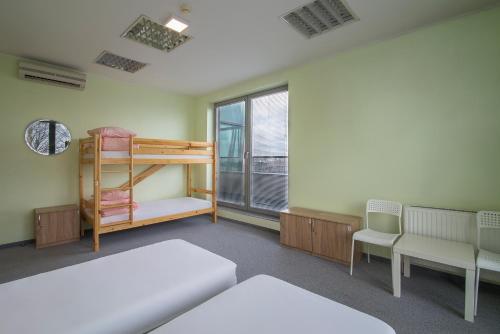 Postel nebo postele na pokoji v ubytování Sea Hostel