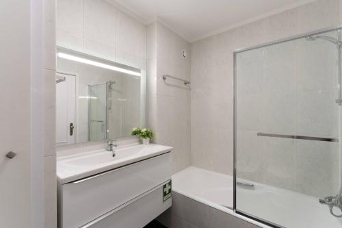 Bright Flat with Balcony & Garage by HostWise