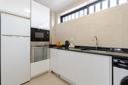 Bright Flat with Balcony & Garage by HostWise