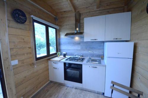 Kuchyňa alebo kuchynka v ubytovaní Casa Marietta