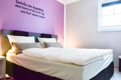 Ein Bett oder Betten in einem Zimmer der Unterkunft Ferienappartement Meeresbrise