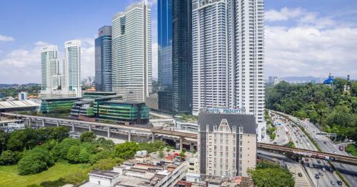 a view of a city with tall buildings at Scott Hotel KL Sentral in Kuala Lumpur