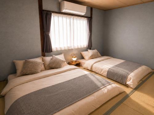 Wakyo aoiya 5min from JR Sta Direct to Umeda & Tsutenkaku 4BR Sleeps 10