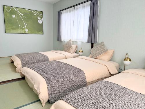 Wakyo aoiya 5min from JR Sta Direct to Umeda & Tsutenkaku 4BR Sleeps 10