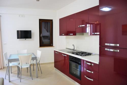 Kuchyňa alebo kuchynka v ubytovaní Costa del Sole