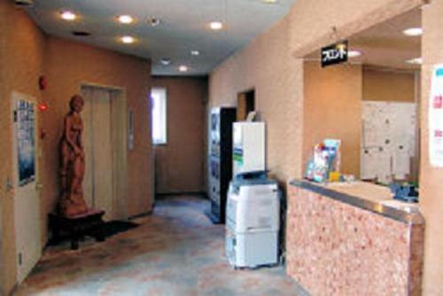 The lobby or reception area at Business Hotel Motonakano