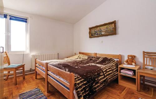 Llit o llits en una habitació de Apartments ZZ