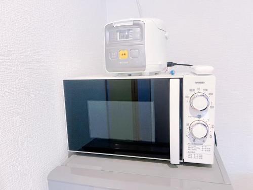 Koiwa 晴の家 302 , 6 minute walk from the subway, served by 2 lines , Convenient access to Akihabara, the airport, Asakusa, and Tokyo Skytree , up to 4 guests