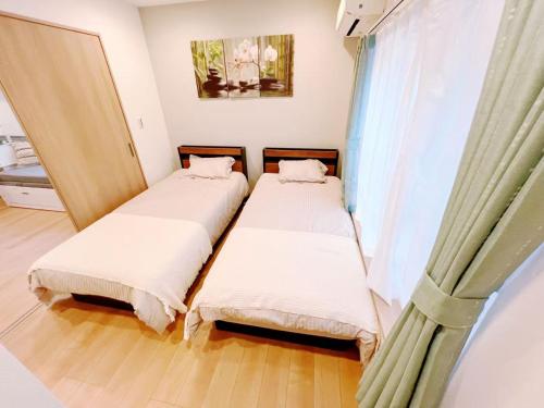 Koiwa 晴の家 302 , 6 minute walk from the subway, served by 2 lines , Convenient access to Akihabara, the airport, Asakusa, and Tokyo Skytree , up to 4 guests