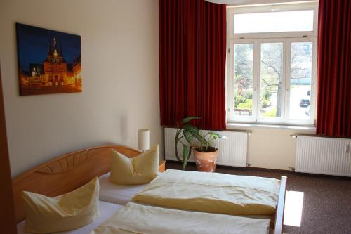 En eller flere senge i et værelse på Ferienwohnungen Patsch